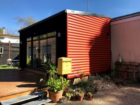 extension bois bardage métal rouge maison proche de saintes