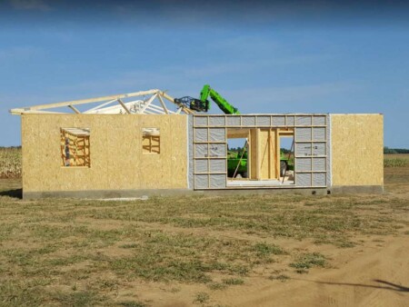 salon exposition sud maison bois